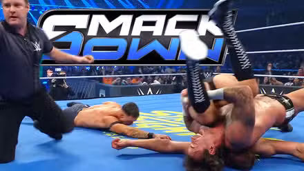 CM Punk pinning Gunther in a match with Finn Balor